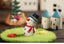 Handmade Christmas tree resin figurine with carved detailing on wooden surface