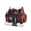 Miniature Christmas house resin ornament with festive details