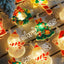 Warm white LED Christmas string lights draped on Christmas tree for festive home decor