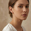 Polished 925 sterling silver cross huggie hoop earrings with hinge closure
