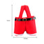 Cloth Christmas candy bag with small belt closure displayed on festive background