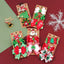 Set of three red and green Christmas bow barrettes for girls styled on a surface