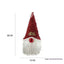 Brown gingerbread man fabric Christmas pendant on white background, holiday ornament with warm charm