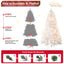 Prelit white Christmas tree with glowing lights in a warm home setting