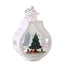 Christmas candle lamp ornament with warm glow on wooden surface