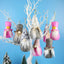 Vintage plush Christmas figure ornament in soft pink for holiday tree display