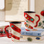 Christmas couple ceramic mug with festive cartoon design for couples
