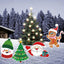Festive Christmas tree yard sign with holiday decorations