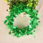 Festive pine garland with hanging stars for Christmas tree decoration