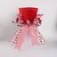Festive magician hat Christmas tree topper with playful holiday design
