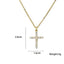 Small cross pendant necklace on gold chain