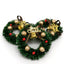 Mini Christmas wreath with bells and ribbon on dark background