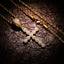 Gold cross pendant necklace with zircon accents on 24-inch twist chain