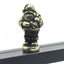 Festive hinged Santa Claus ornament with metal construction hanging from branch