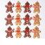 Gingerbread man Christmas ornament set displayed on festive tree