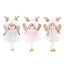 Sequined angel pendant ornament with bell hanging against festive background