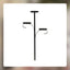 Christmas tree with elegant wrought iron candlestick tree topper glowing warmly