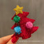 Colorful cloth snowflake brooch with festive holiday design