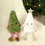 Festive plush doll Christmas ornament in green and white fabric hanging from a tree branch