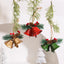 Wrought iron pine cone and double bell pendant in gold finish for Christmas decor