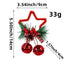 Five-pointed star bell ornament in gold hanging on a Christmas tree with warm lights