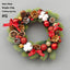 Upside down Christmas tree wreath with horn accents hanging on door