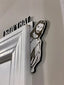 Wooden door frame ornament with humorous holiday characters featuring Jesus and Santa elk figures