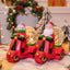 Festive Christmas music box ornament displayed on a decorated holiday tree