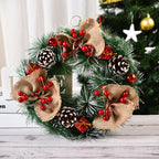 Close-up of white fruits and decorative knots on Christmas garland