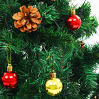 Fully decorated artificial Christmas tree with illuminated branches and ornaments