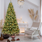 Close-up of green Christmas tree foliage and prelit branches