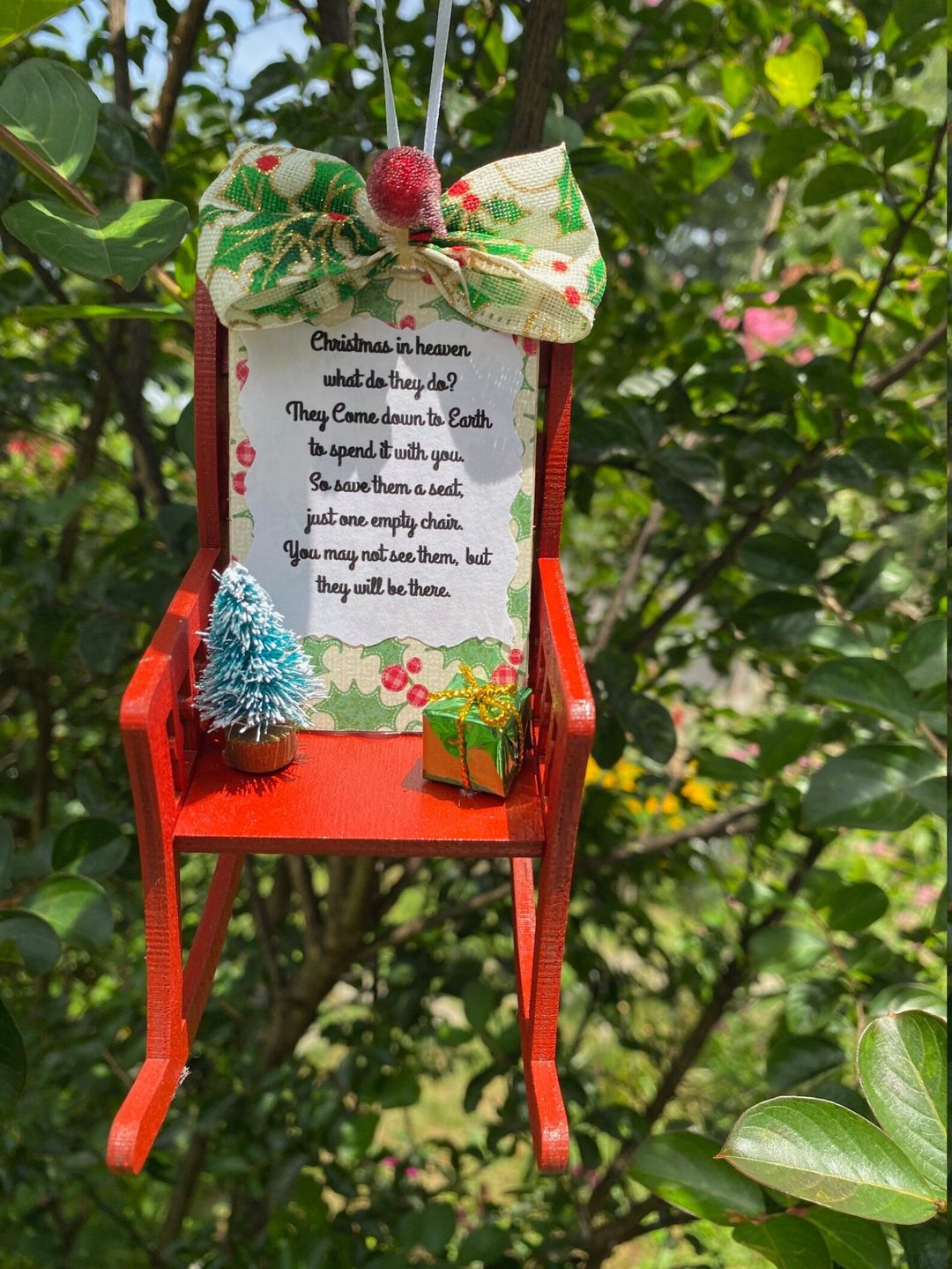Heaven Chair rustic Christmas ornament with red and wood-tone finish displayed on tree Main image