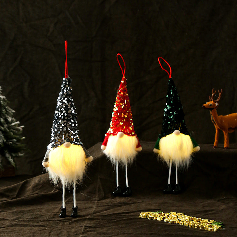 Close-up of sequined fabric texture on Christmas doll