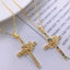 Gold cross pendant necklace with zircon accents on delicate chain
