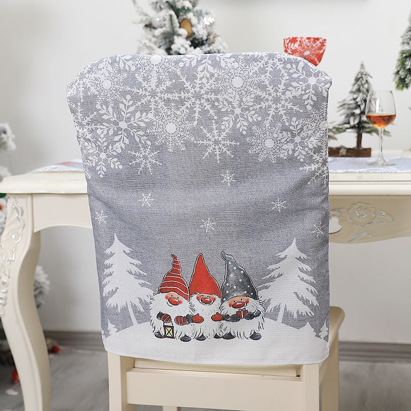 Holiday themed chair cover with printed alphabet design for Christmas decor