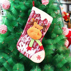 Christmas gift bag featuring knitted doll design
