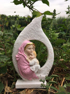 Set of two resin Nativity ornaments in pink and peacock blue, intricately hand painted