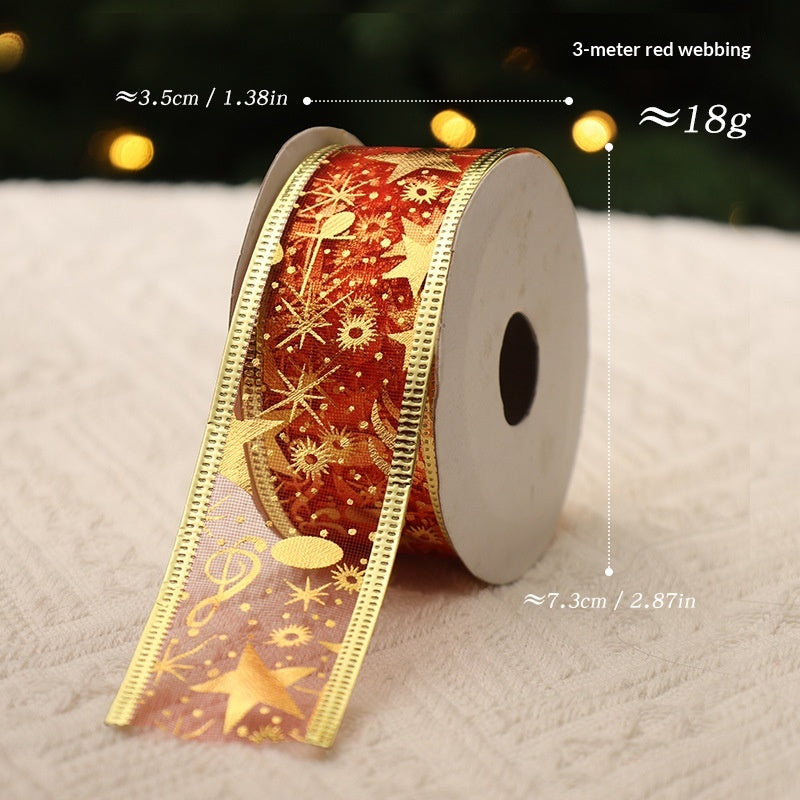 Festive fabric Christmas ribbon in rich red tones arranged for holiday display