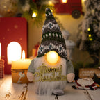 Colorful Christmas nose decoration featuring playful dwarf characters with warm glow