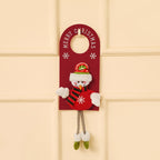 Festive Christmas door hanger with snowman design and scarf decorations on wooden door