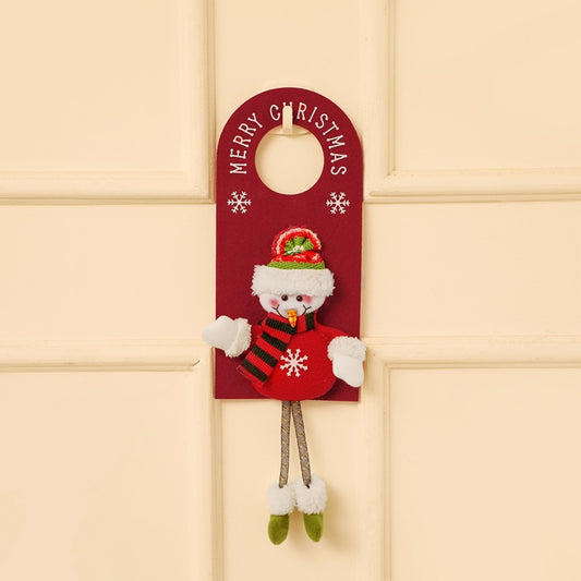 Festive Christmas door hanger with snowman design and scarf decorations on wooden door