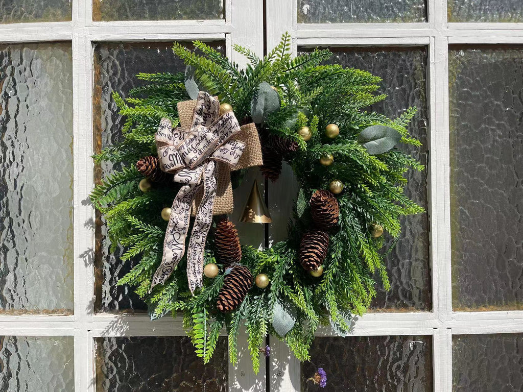 White finished artificial wreath with green pine needles for mantle display