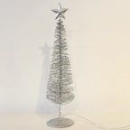 Christmas tree ornament in blue and gold with subtle illumination