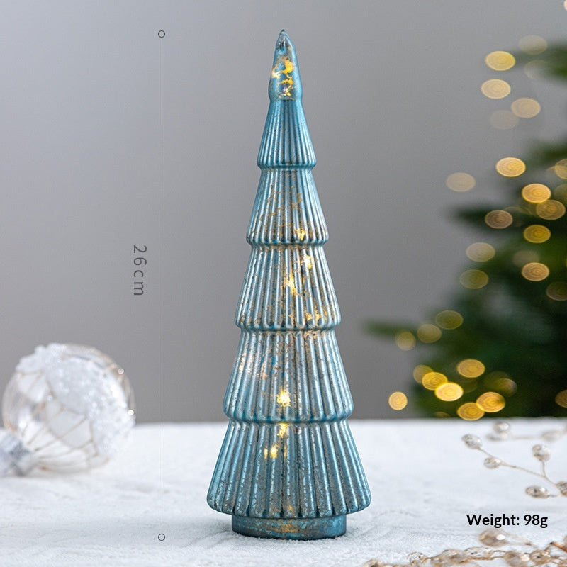 Large green glass star ornament with smooth reflective finish for Christmas tree decorating