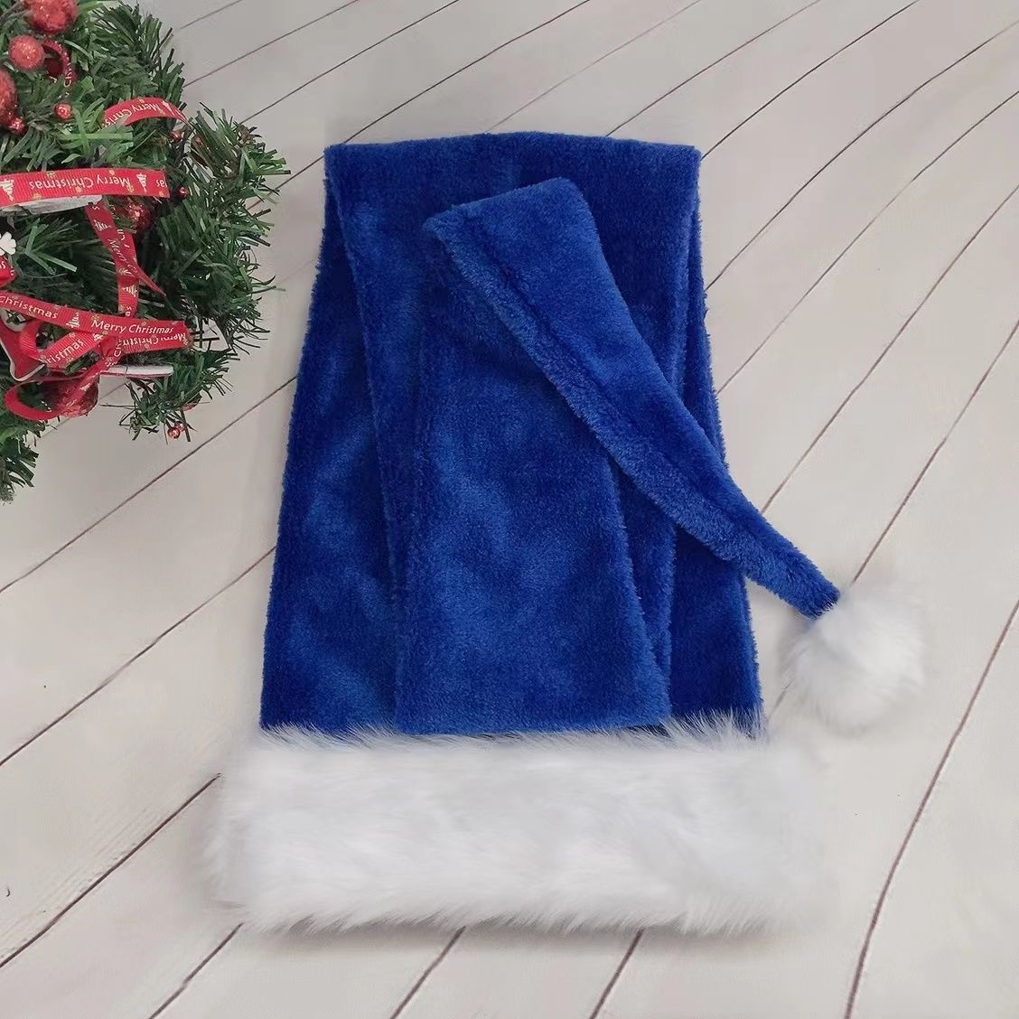 Extra-long plush Santa hat for Christmas party celebrations Main image
