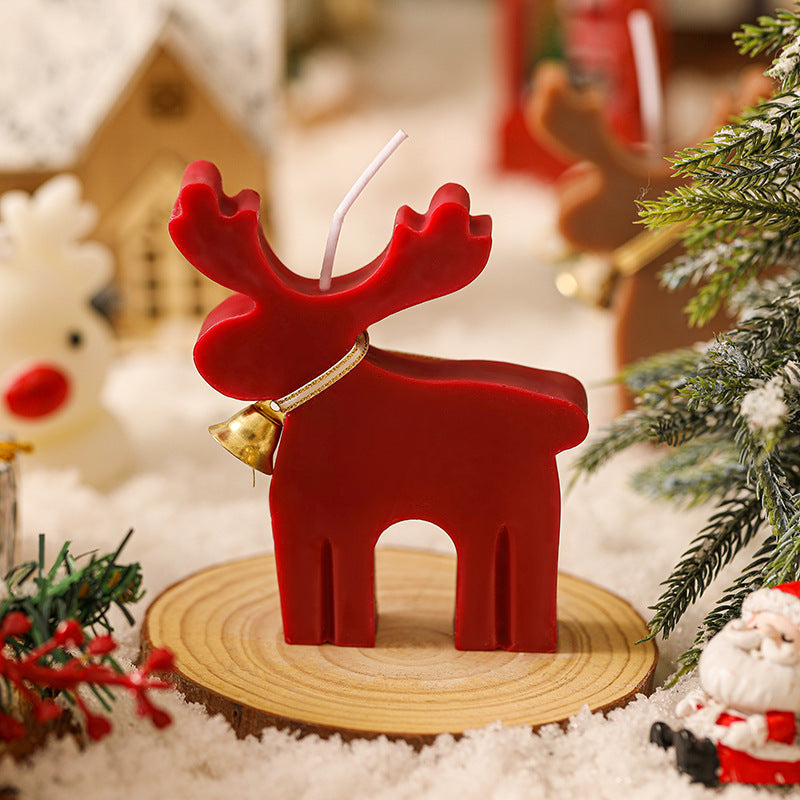 White rose colored handmade elk-shaped Christmas candle