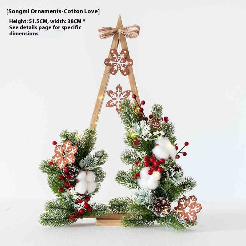 Set of two Christmas tree ornaments in different floral styles with soft illumination
