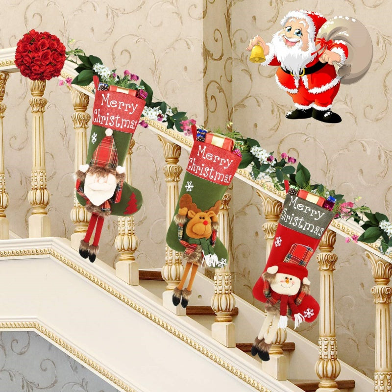 Set of three Christmas stockings with hanging loops ready for fireplace or tree decorating with faith-inspired holiday spirit