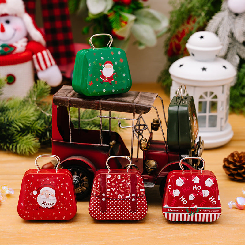 Miniature tinplate handbag candy box in festive holiday style