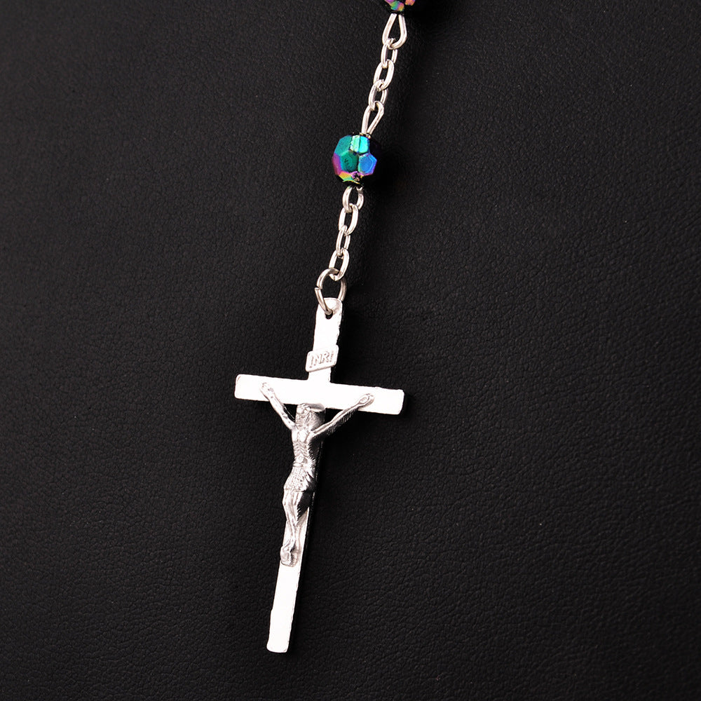 Rosary necklace laid flat showing the chain length and pendant drop for prayer beads